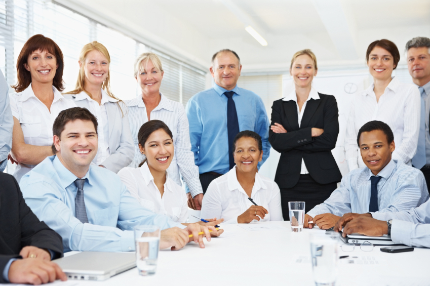 group of professionals gathered around table