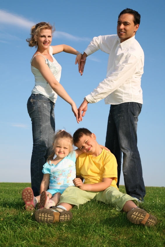 Family forming a heart