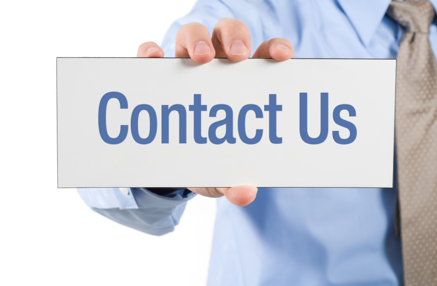 person holding contact us sign