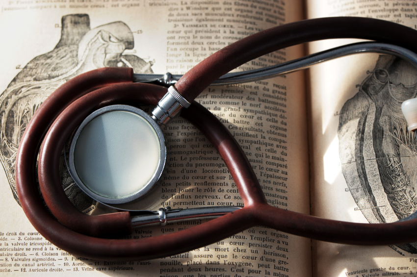 stethoscope laying on book
